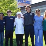 Student ambassadors standing outside Polaris Career Center, showcasing a welcoming and vibrant educational environment