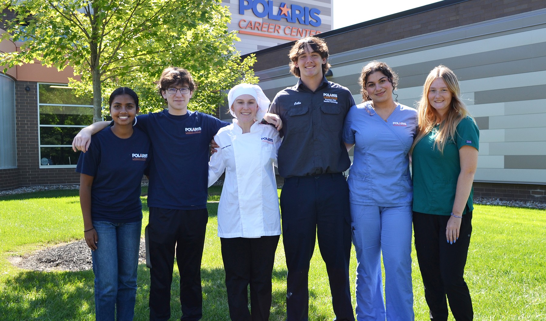 Student ambassadors standing outside Polaris Career Center, showcasing a welcoming and vibrant educational environment