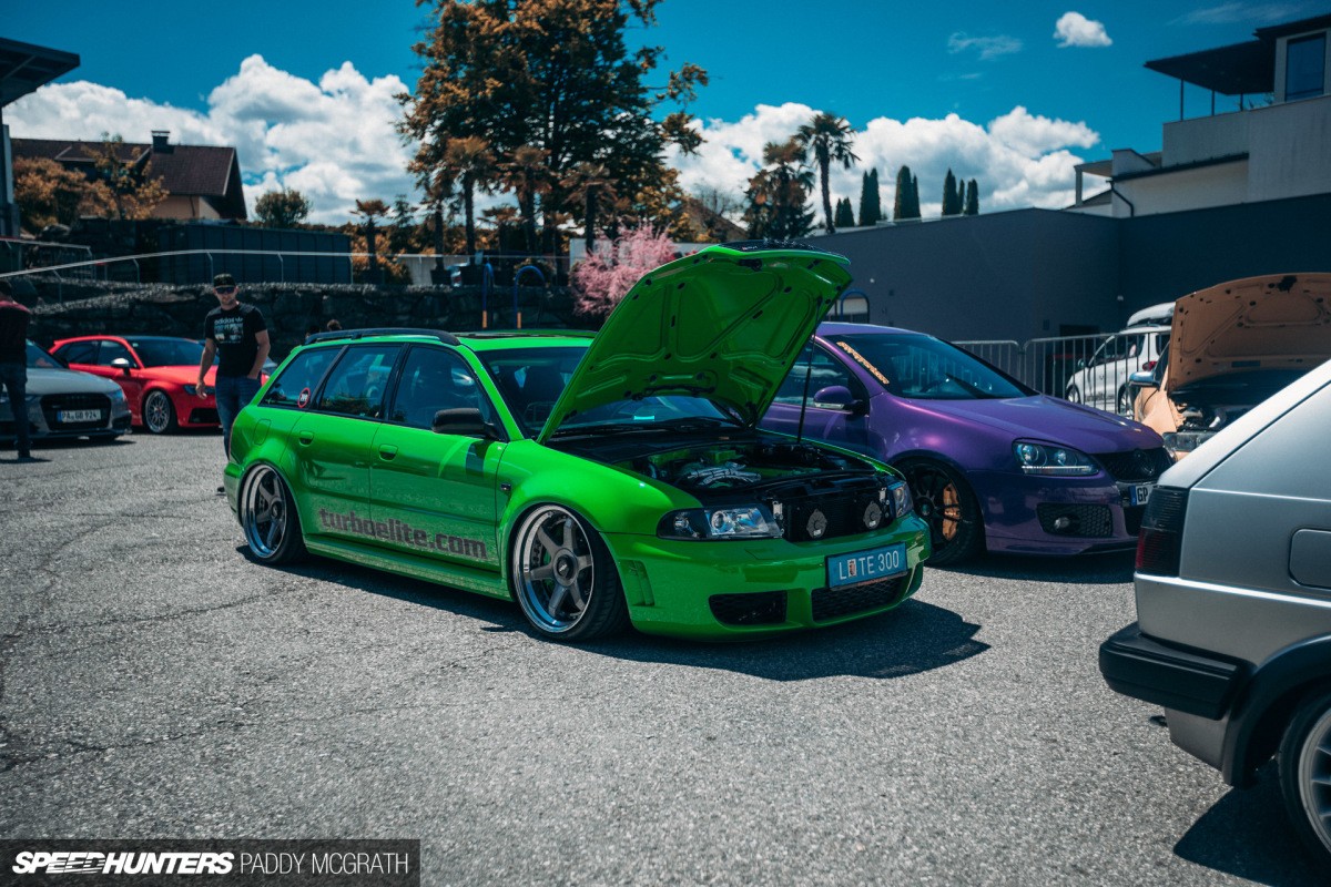 Signal Green Audi RS4 B5 at Wörthersee 2019, front quarter view, showcasing its aggressive stance and Rotiform wheels