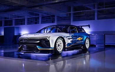 The 2025 Chevrolet Blazer EV.R NASCAR Concept car angled for a dynamic side view, showcasing its stock car modifications and racing livery.