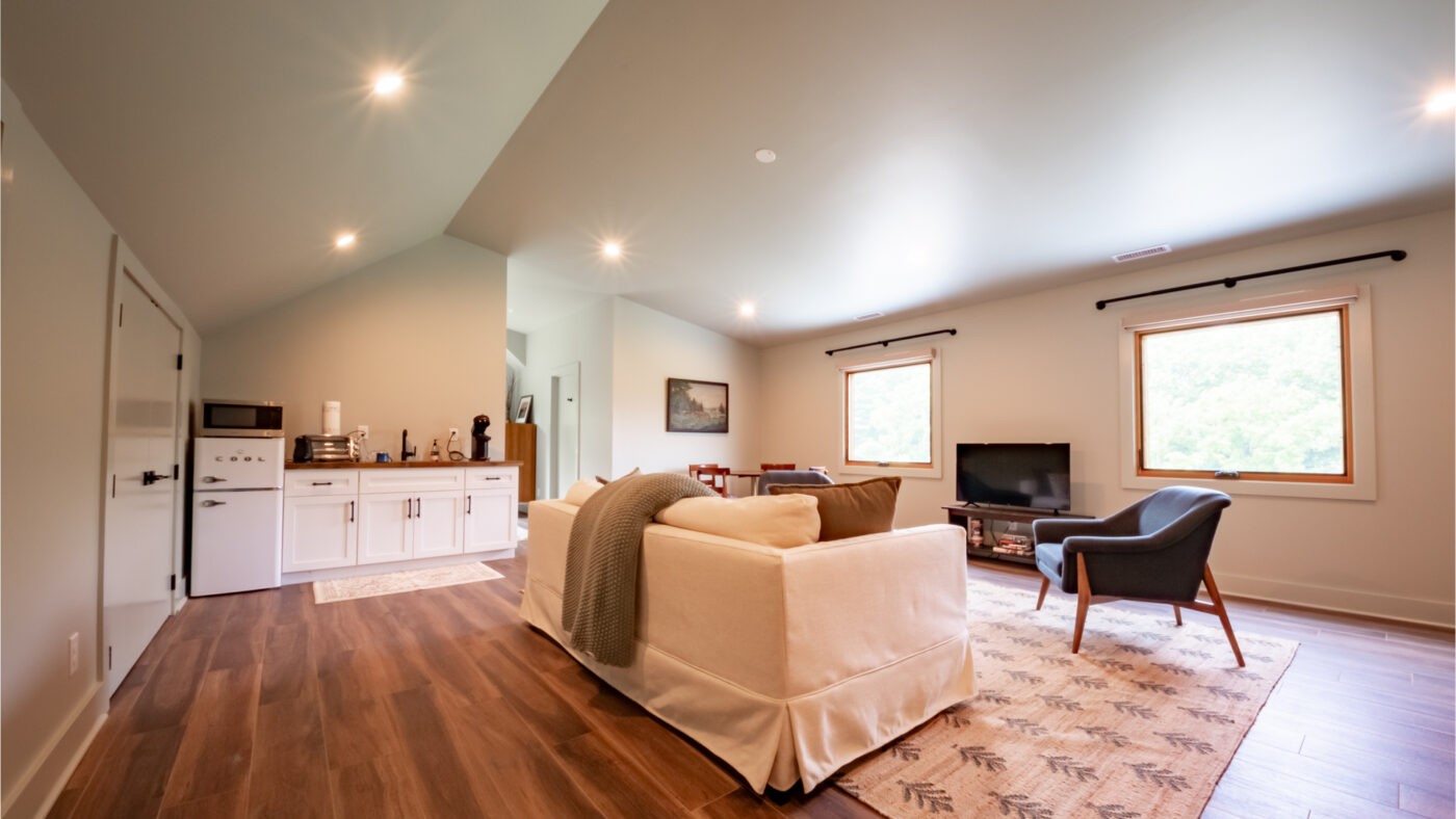 An apartment space in a three-car garage with adequate square footage