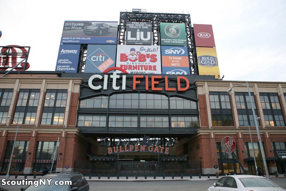 Citi Field stadium across from a line of auto body shops in Willets Point, Queens, NYC