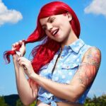 Carly Aquilino headshot promoting her stand-up shows at Comedy Works Denver