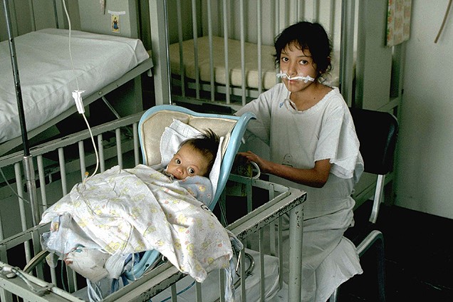 A young girl receiving palliative care, highlighting the need for global access to such care, especially in low- and middle-income countries where the majority of children in need reside.