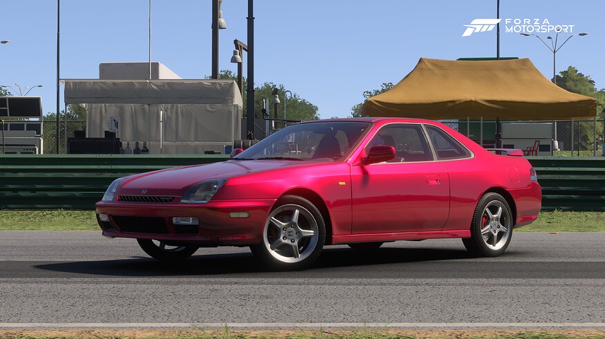 Front view of the deformed Honda Prelude BB6 car model in Forza Motorsport, highlighting oversized wheels and disproportionate front end