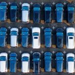 Overhead photo of a fleet of service vans.