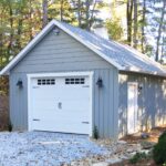 Exterior view of an 18x26 one car garage with a wide door, showcasing ample space and overhead clearance.