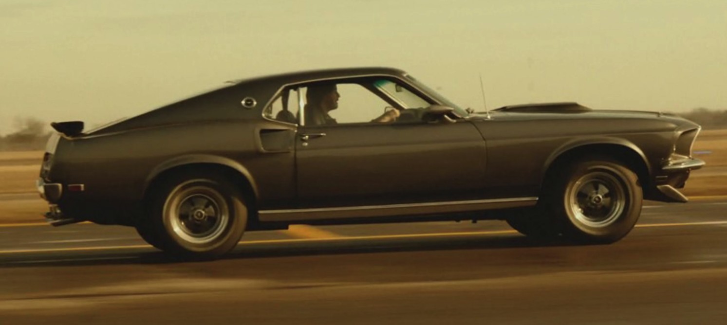 John Wick in action with his Boss Mustang