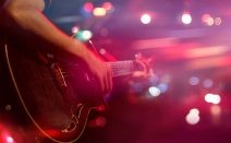 Tracy Chapman playing guitar at the Grammys 2024