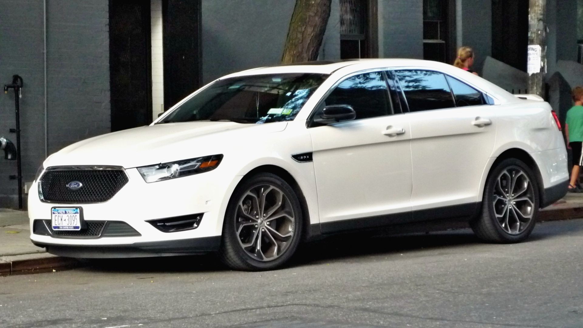 White Ford Taurus SHO