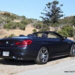 Exterior view of the 2012 BMW M6 Convertible showcasing its sleek design and soft-top roof.