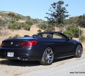 Exterior view of the 2012 BMW M6 Convertible showcasing its sleek design and soft-top roof.