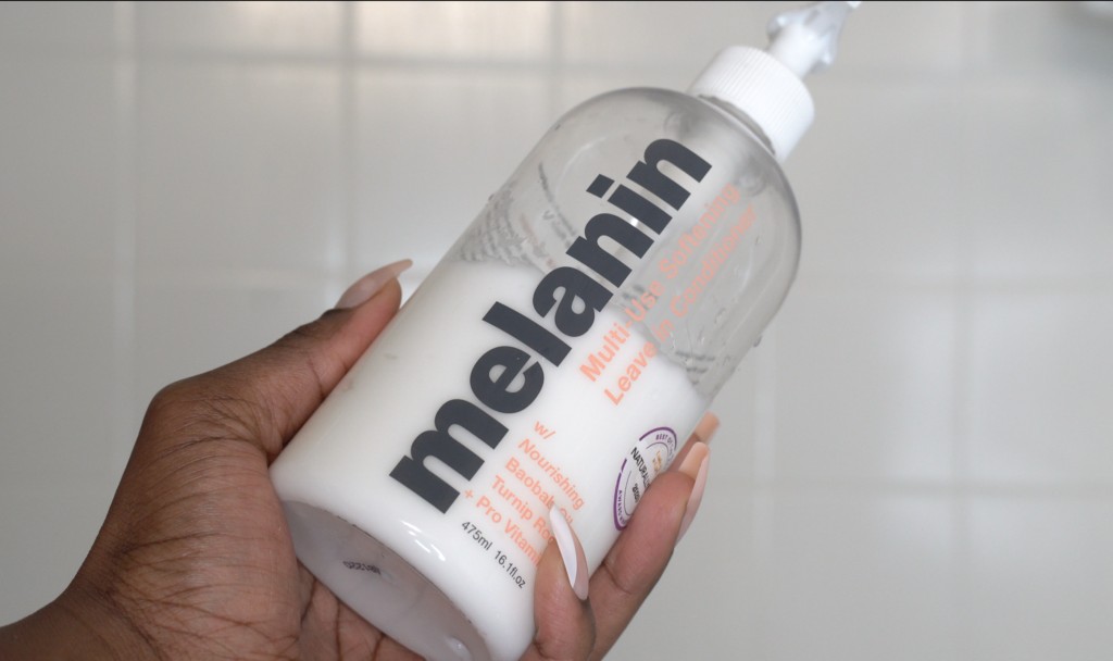 Melanin Haircare Multi-Use Softening Leave-in Conditioner bottle, highlighting versatile hair product for hydration and detangling.