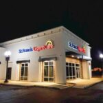 Night view of St. Francis Urgent Care Monroe location exterior.