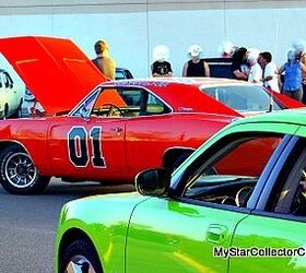 The General Lee, a 1969 Dodge Charger from The Dukes of Hazzard TV show, jumping over a dirt ramp, highlighting car stunts and potential damage